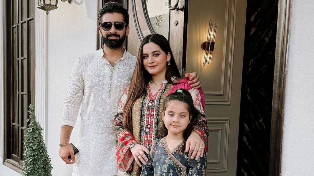 Aiman Khan smiling with family while celebrating the birth of her third daughter Naimal