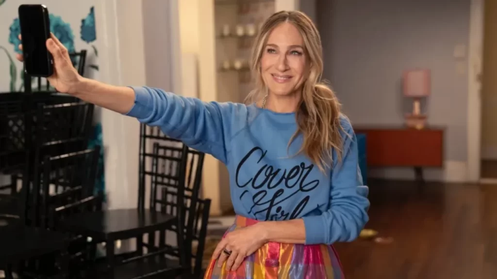 Sarah Jessica Parker as Carrie Bradshaw speaking passionately in a promotional still.