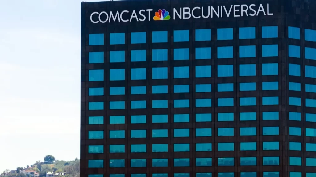 MSNBC signage with iconic peacock logo displayed on a building exterior.