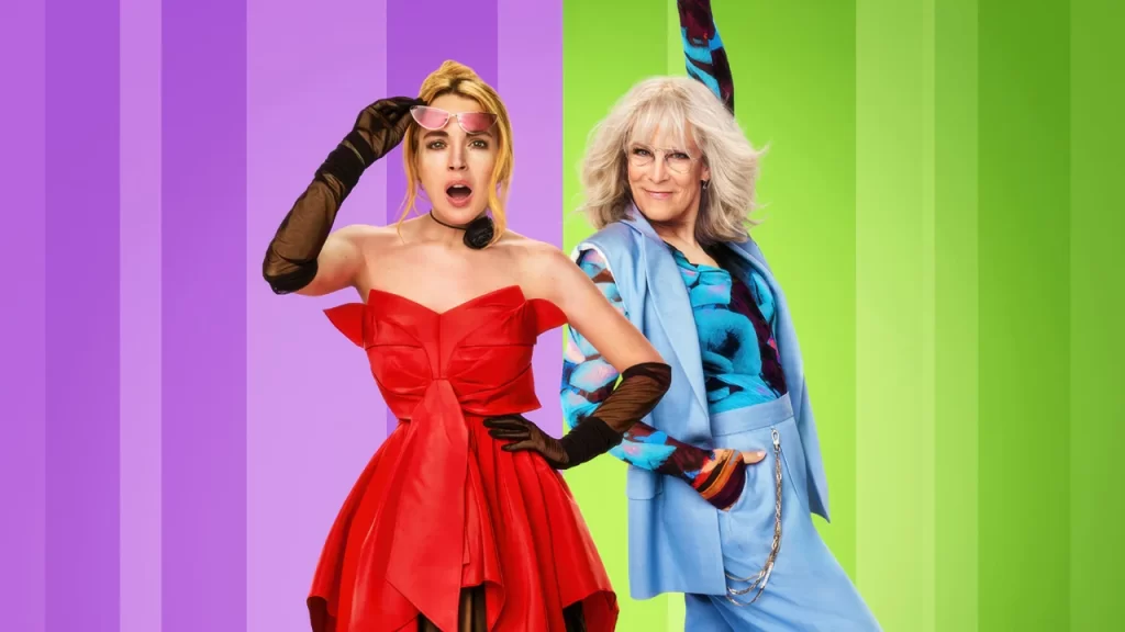 Lindsay Lohan and Jamie Lee Curtis laughing together in a colorful scene from Freakier Friday (2025)