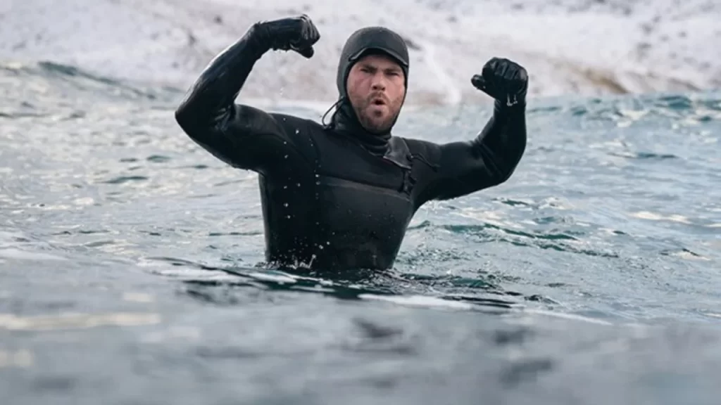 Chris Hemsworth performing a physical challenge in cold water for Limitless: Live Better Now.