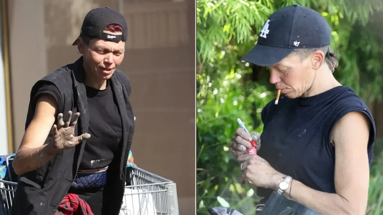 Homeless former model Loni Willison pushing a shopping cart filled with belongings and a discarded trees.