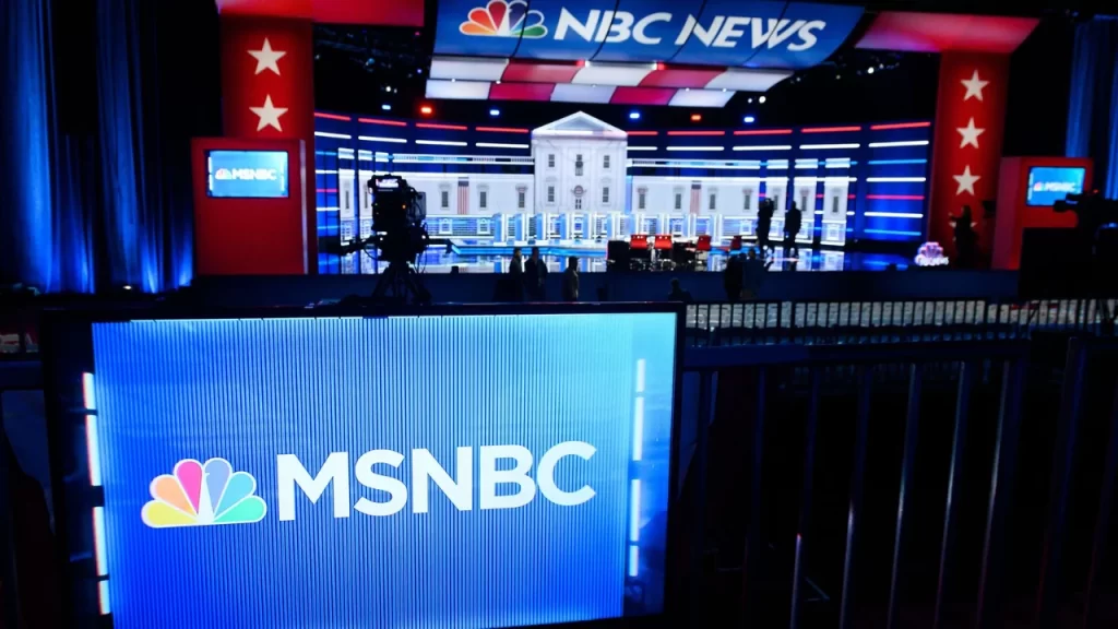 Inside a live MSNBC broadcast studio, capturing the network’s operational look today.