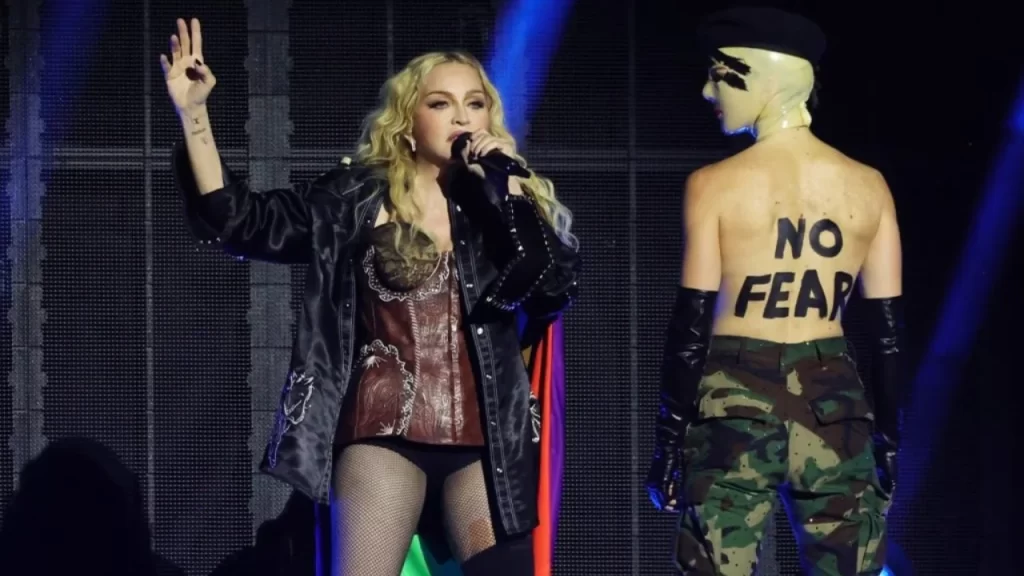 Madonna styled in bold fashion representing her Veronica Electronica era and electronic alter-ego.