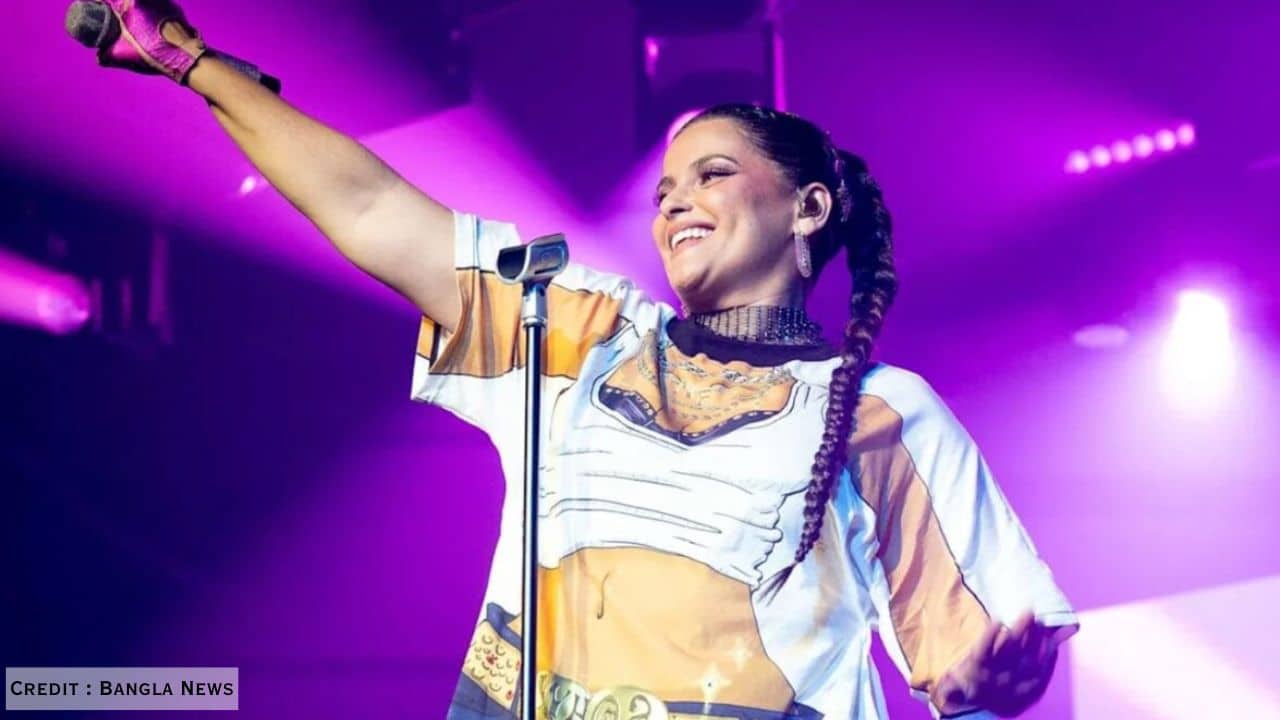 Nelly Furtado wearing oversized cartoon T-shirt at Manchester Pride 2025, sending body-positivity message on stage.