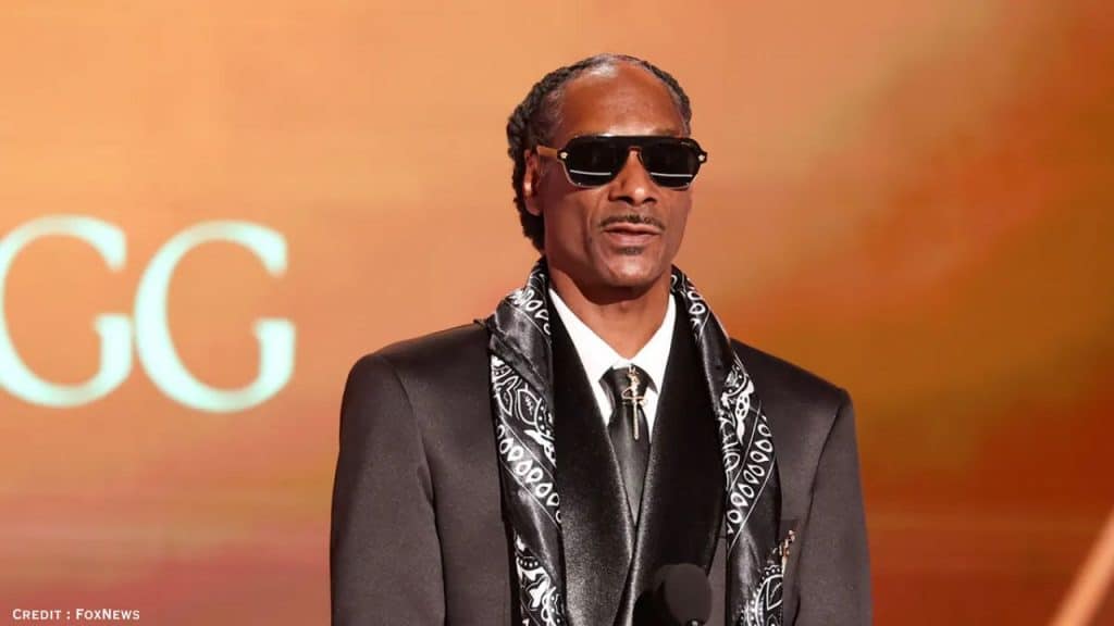 Snoop Dogg posing formally, reflecting on media controversies