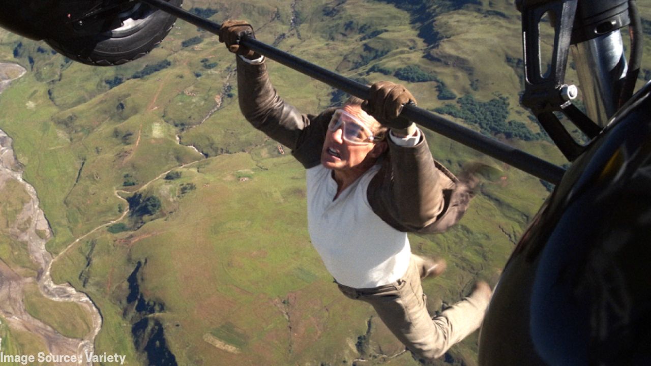 Close-up of Tom Cruise gripping tightly during high-speed stunt that caused finger joint injury.