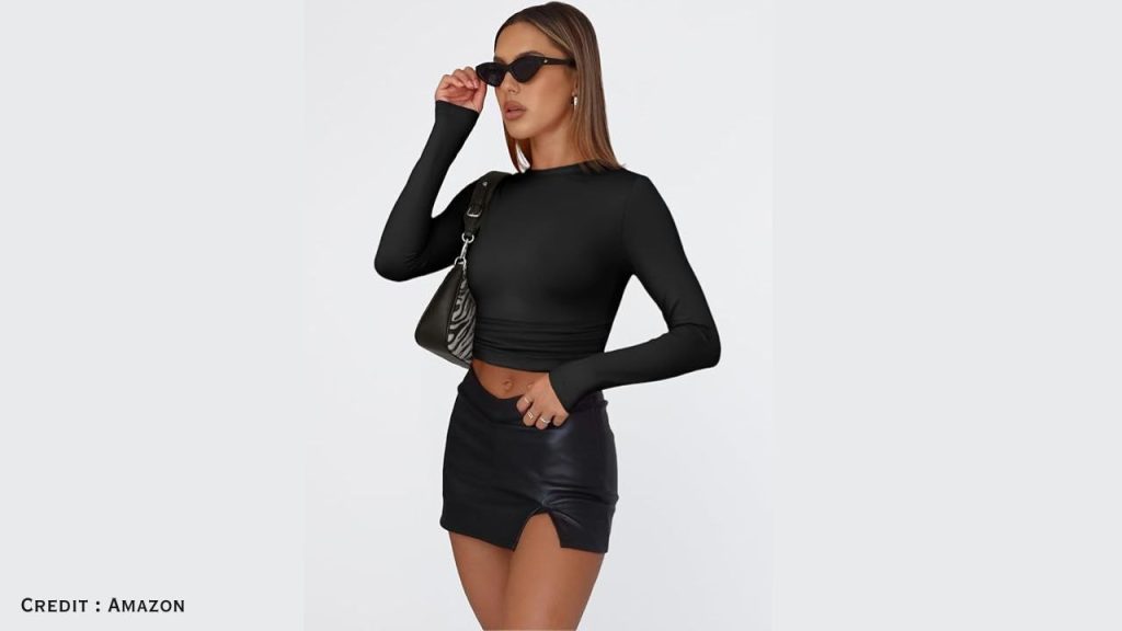 Model wearing Trendy Queen long sleeve crop top with jeans