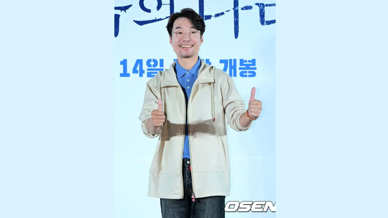 Portrait of Korean actor Song Young-kyu smiling in a formal suit