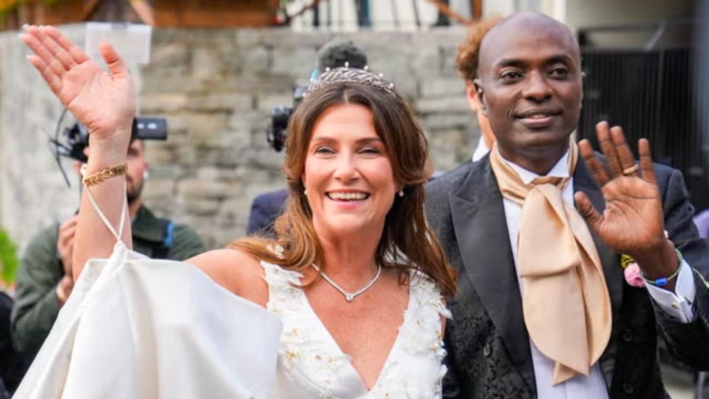 Märtha Louise and Durek walking hand in hand, capturing a behind-the-scenes moment from their wedding featured in the documentary
