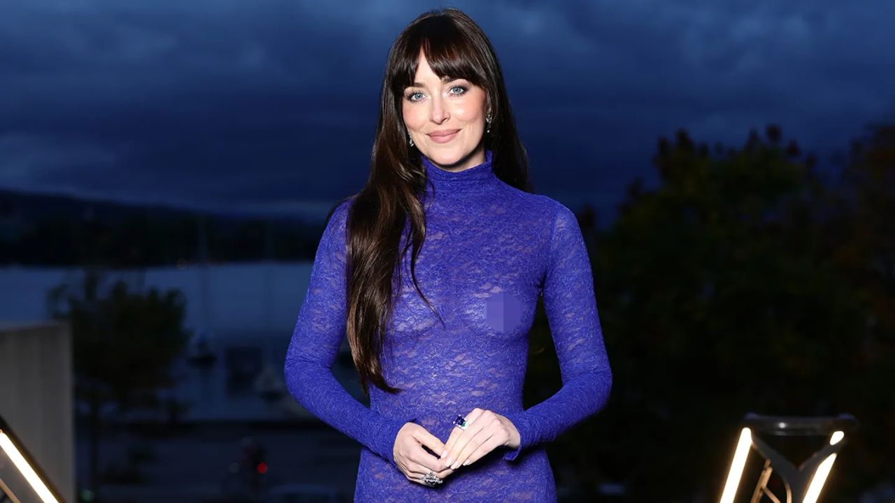 Dakota Johnson in gucci gown at film festival