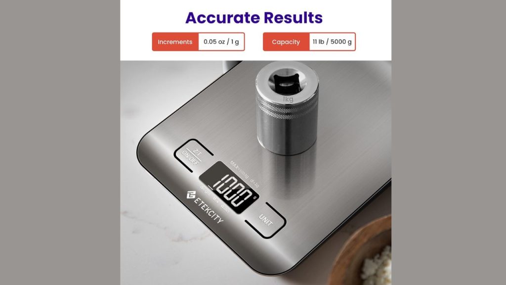 Compact stainless steel Etekcity kitchen scale showing precise digital measurement for baking and meal prep
