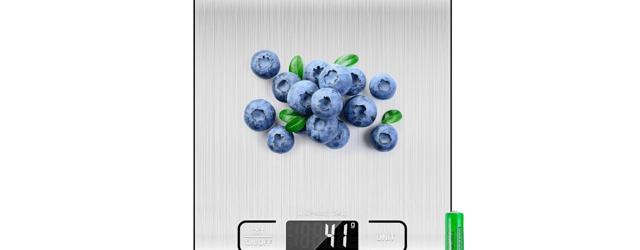 Etekcity Food Kitchen Scale in stainless steel holding bowl of berries to demonstrate precision weighing