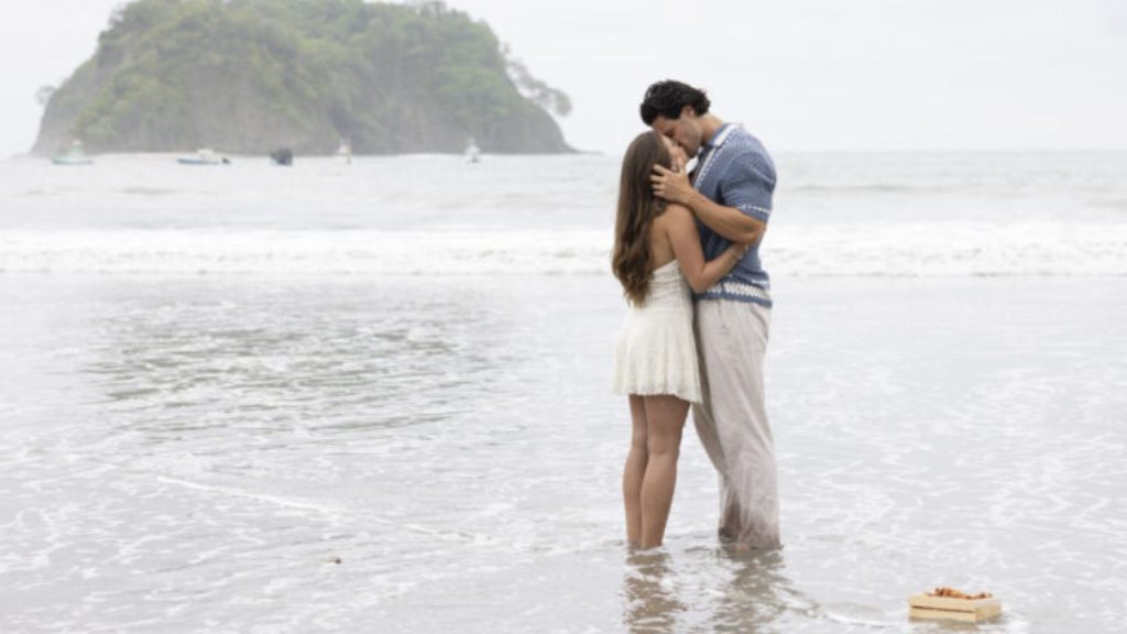 Jess Edwards and Spencer Conley embrace by the shore following the finale, looking happy and in love.