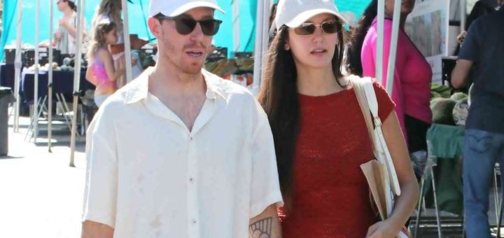 Shaun White and Nina Dobrev holding hands at a farmers market in Los Angeles, days before their split