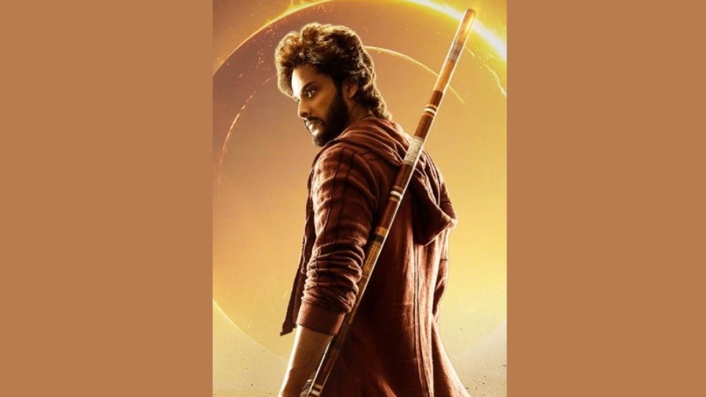 Teja Sajja standing powerful in the first-look poster of Mirai with erupting volcano and eclipse background.