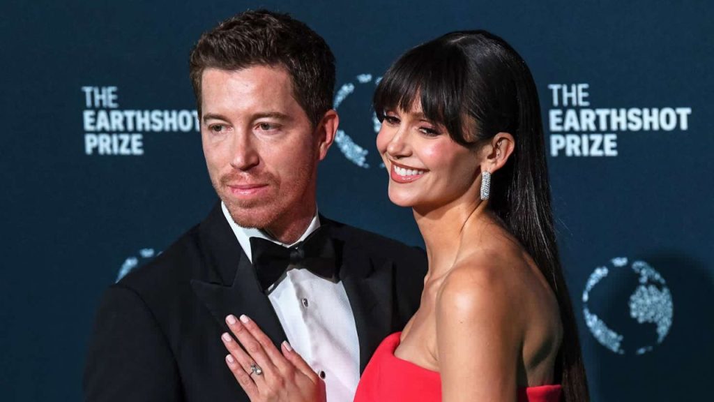 Shaun White and Nina Dobrev posing together at The Snow League celebration in Aspen