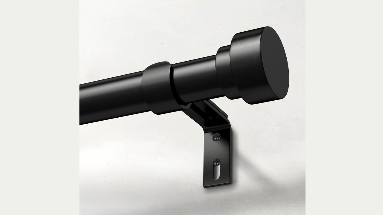Strong heavy duty curtain rod supporting thick curtains