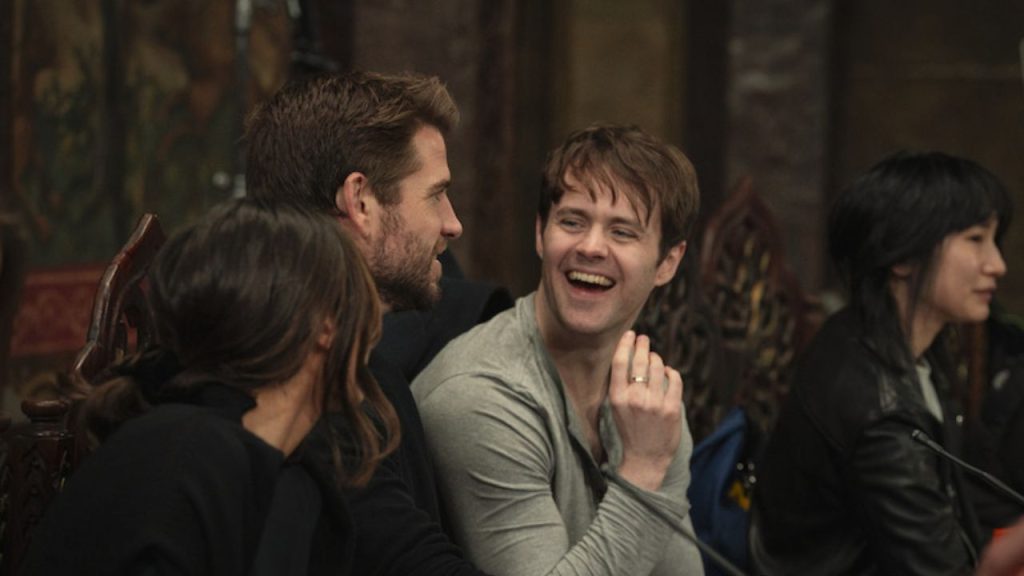 Anya Chalotra, Freya Allan, Joey Batey and others laughing during a table-read session in the witcher season 4