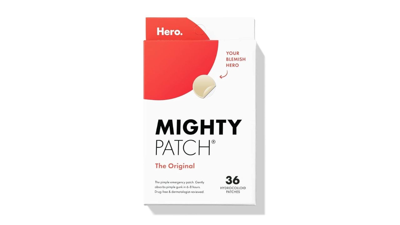 Close-up of a clear Mighty Patch pimple patch on skin, showing the absorbed fluid turning the center white.